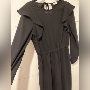 Fleurette Jumpsuit
Ruffled, long sleeve wide-leg jumpsuit